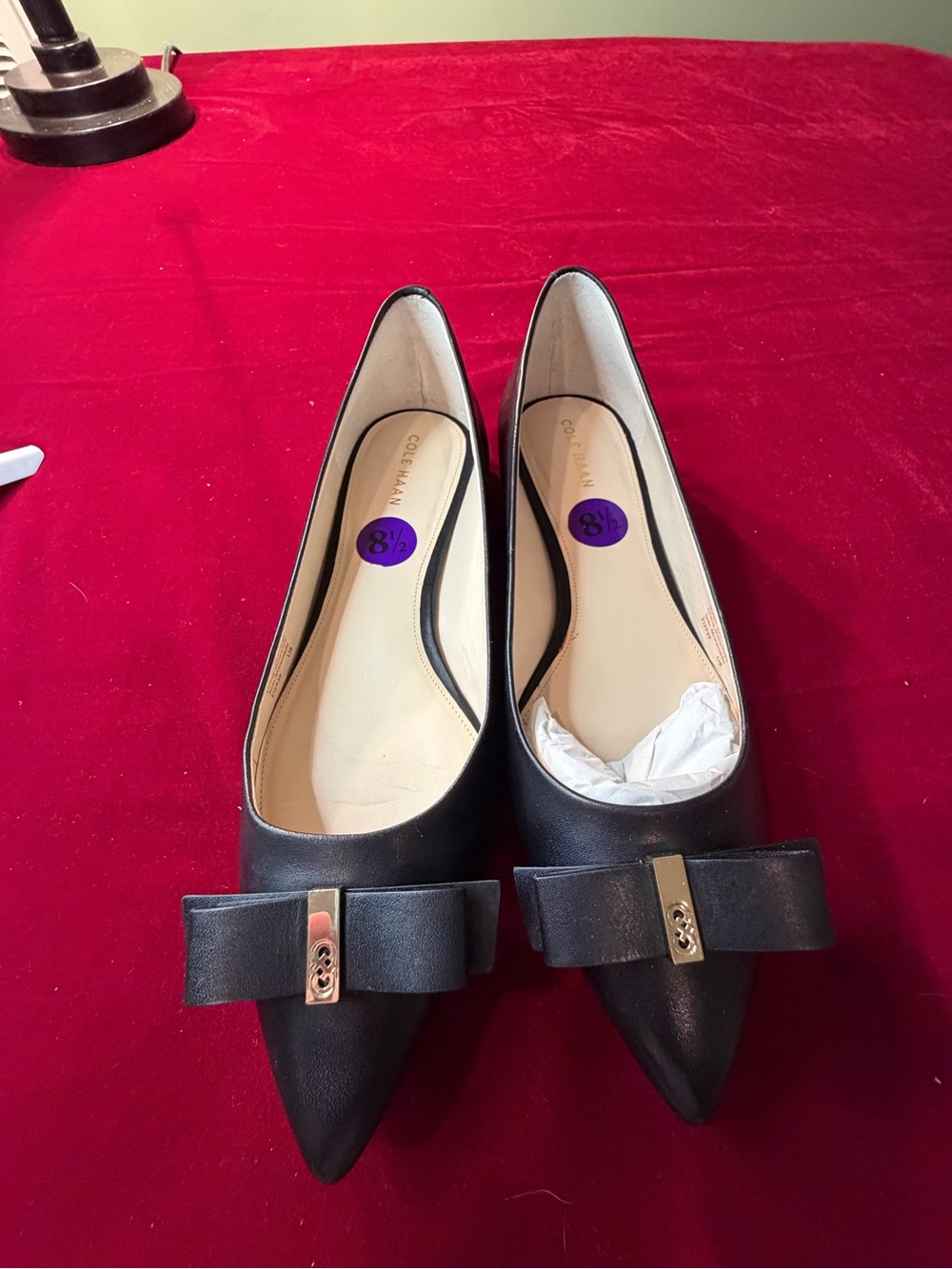 Cole Haan Black Pointed-Toe Bow Flats with Gold Accent